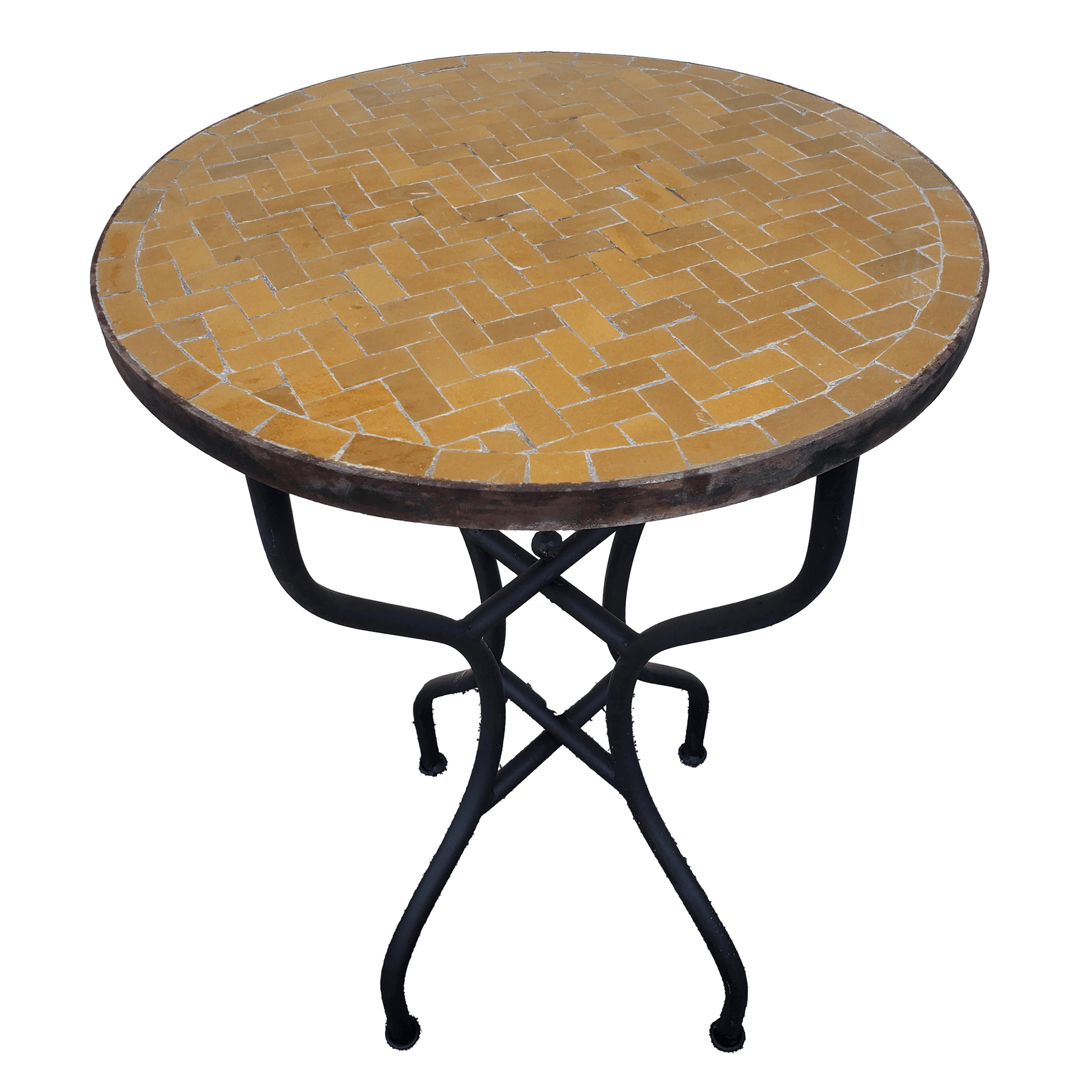 A mosaic patio table using amber zellige tiles and featuring herringbone pattern with black wrought iron base