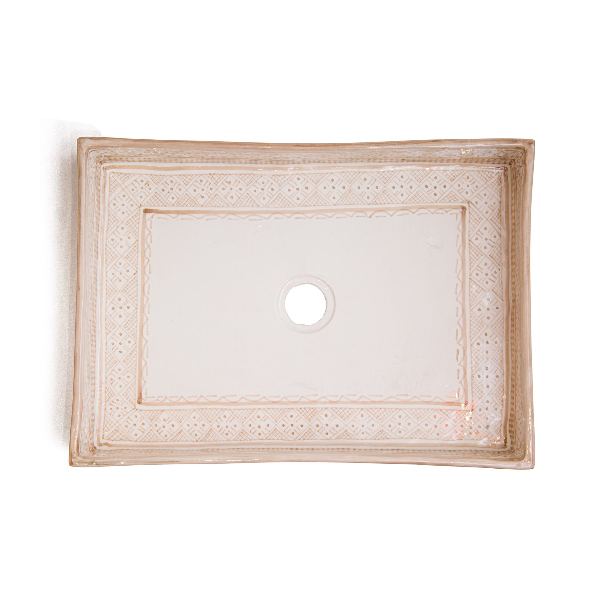 Top-down view of rectangular vessel sink displaying clean interior and decorative border frame