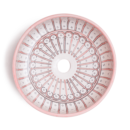 Overhead view of Moroccan round ceramic basin displaying full radial arch pattern with central drain opening and geometric border