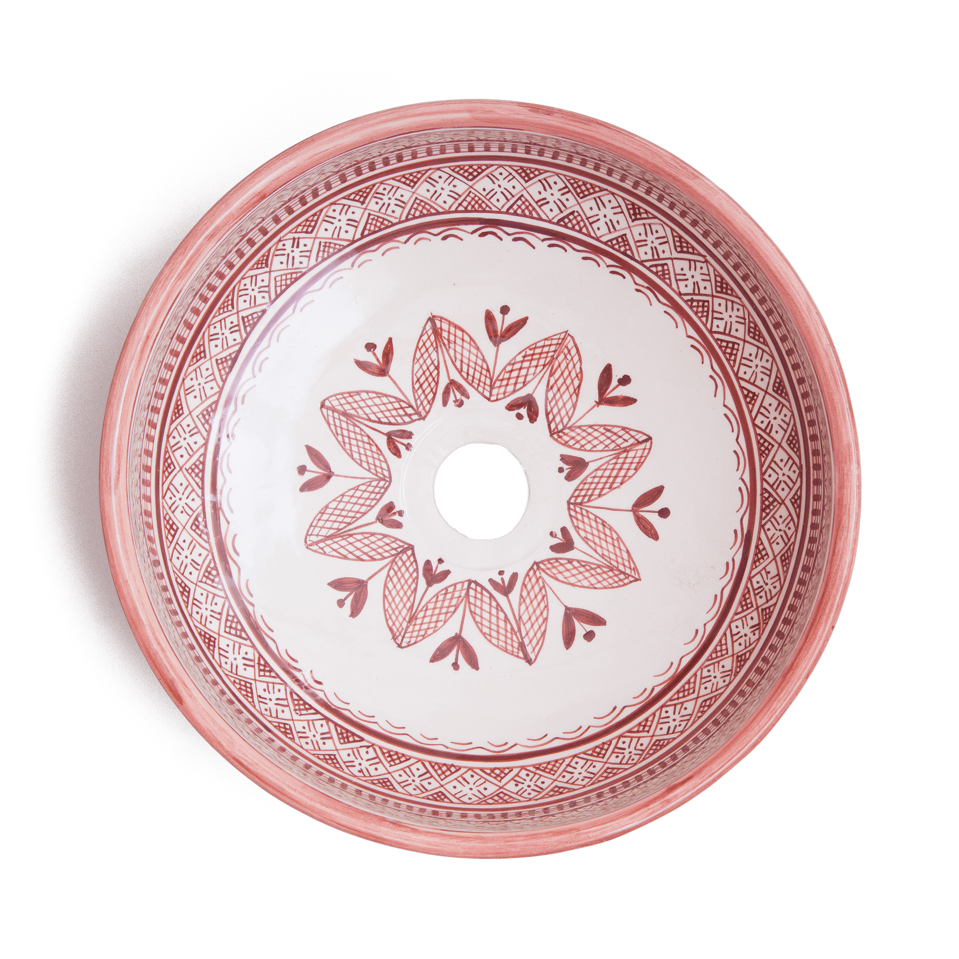 Overhead view of Moroccan round ceramic basin displaying full interior floral pattern with central drain opening