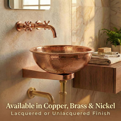 Polished copper sink support bracket with hammered copper vessel sink and wall-mounted cross-handle faucet in modern bathroom