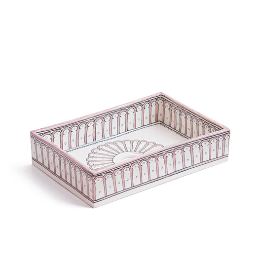 Three-dimensional perspective view of rectangular ceramic sink displaying pink arch colonnade patterns and interior medallion on white ceramic surface