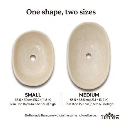 Small and medium beige tadelakt vessel sinks from above: small 38.5 x 30 cm (15.2 x 11.8 in), medium 53.5 x 33.5 cm (21.1 x 13.2 in)