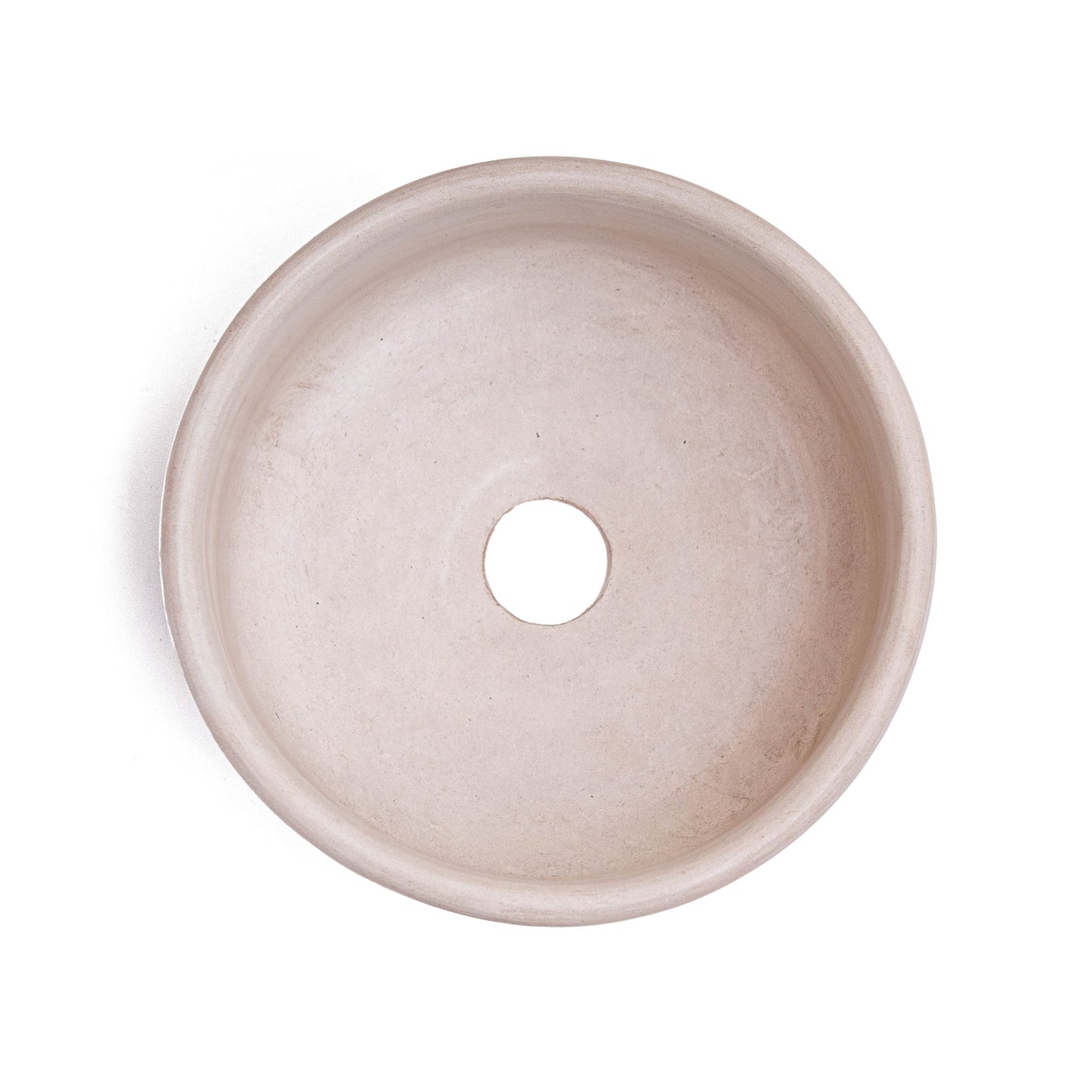 Top-down view of handcrafted Moroccan round ceramic vessel sink showing smooth interior surface with centered drain opening
